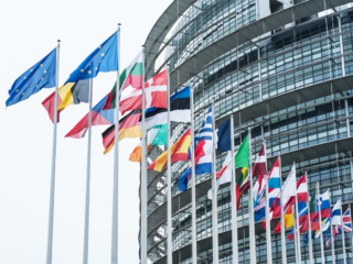 eu-retail-of-facade-with-flags-of-european-union-parliament