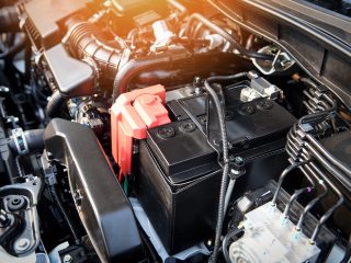 battery car engine detail motor / close up of machine new batteries car engine checking car battery cleaning for deliver customers in the car service